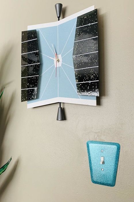 The blue wall plate covering a light switch