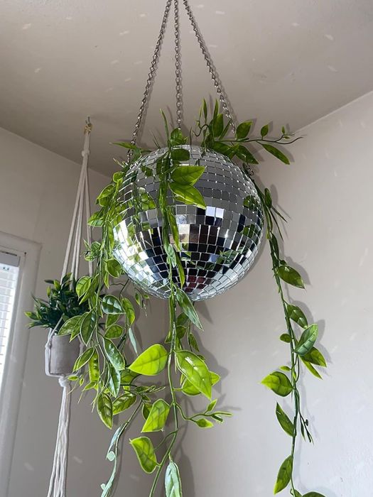 Reviewer photo of the disco ball planter hanging gracefully