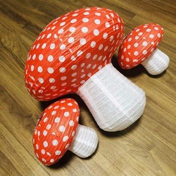Three red-top mushroom lanterns