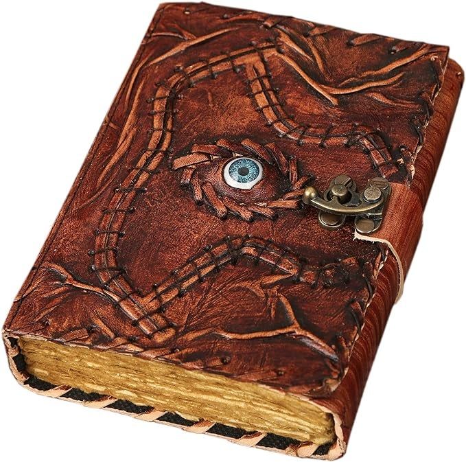 A leather-bound journal adorned with an eye-catching cover design and a detailed clasp, perfect for writing or gifting