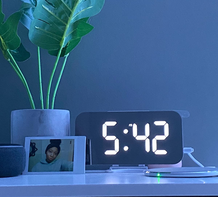 A reviewer’s gleaming mirrored clock