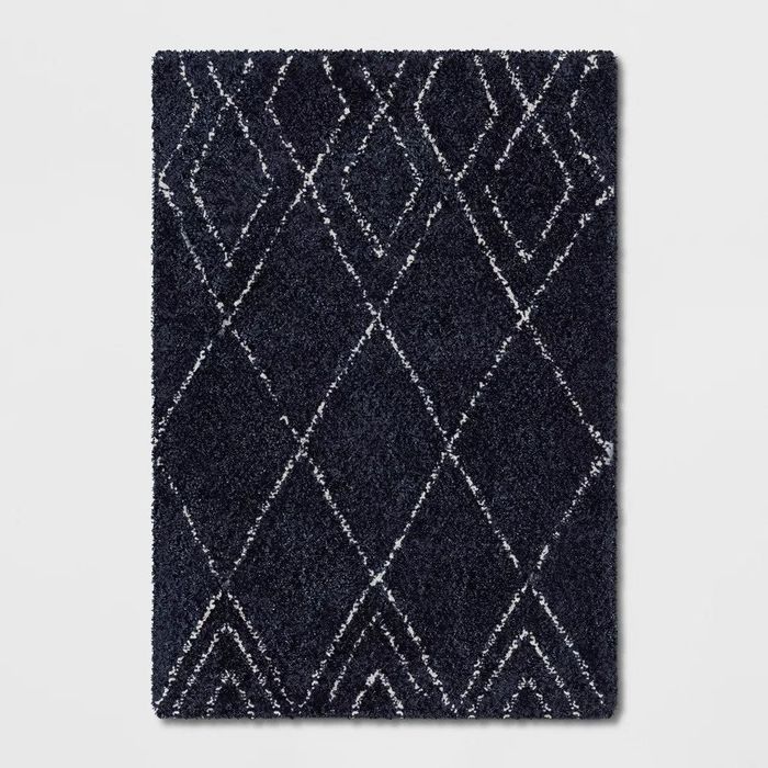 A close-up of the shag rug featuring a diamond design