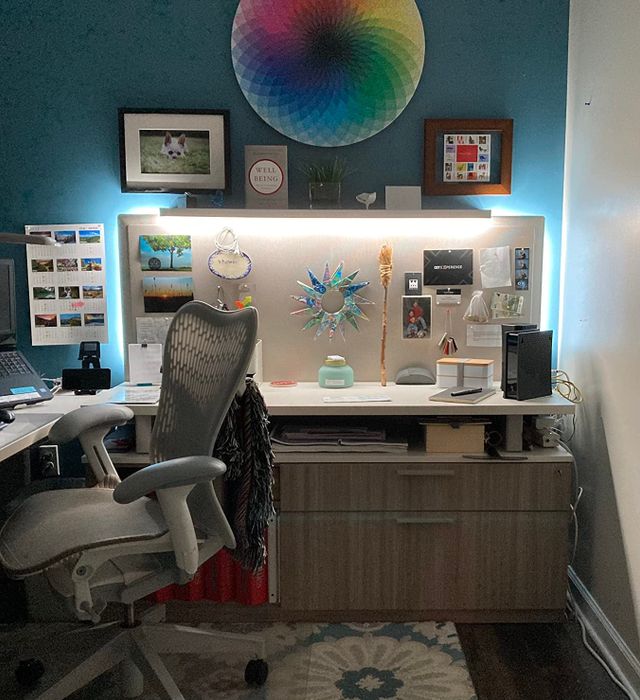 Another reviewer's photo demonstrating the lights used in a home office, casting a warm glow over the desk area.