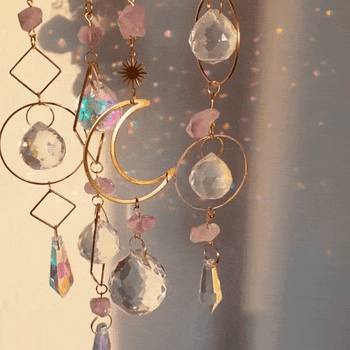 A gif showcasing the glimmer of the four sun catchers as they shine in the sun.
