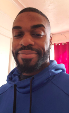 A reviewer sporting a well-kept beard