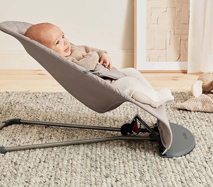 A baby in the BabyBjörn Bouncer