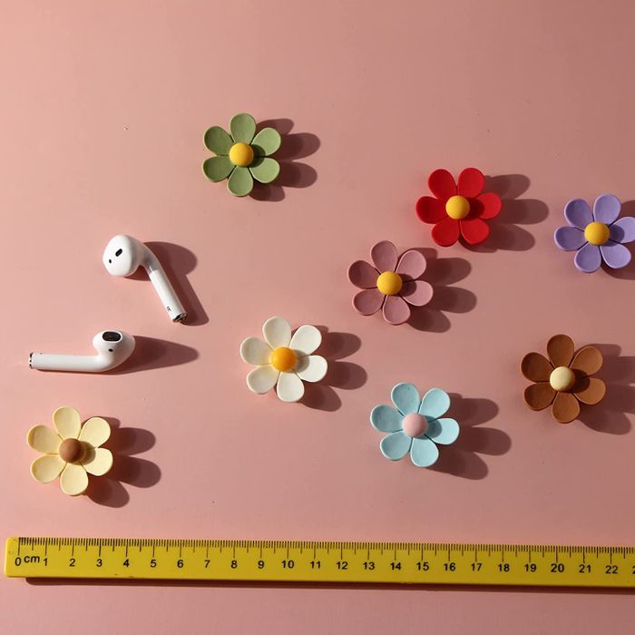 Flower magnets featuring curved, petal-like designs