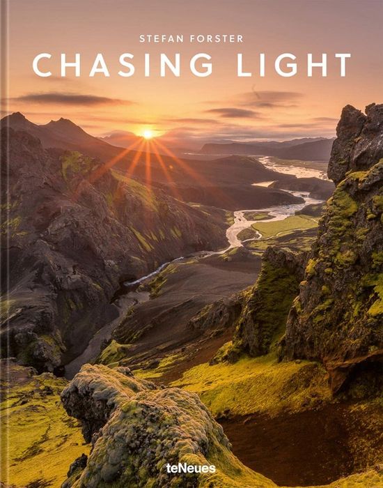 cover of book depicting a sunset behind towering mountains