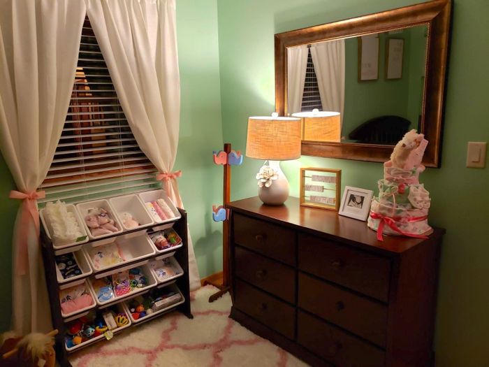 The toy organizer is shown in a nursery