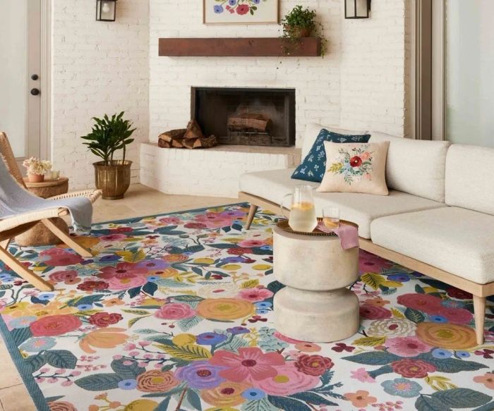 a brightly patterned floral area rug