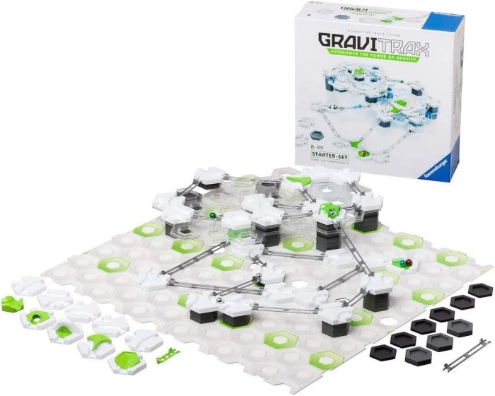White, black, and green pieces from the Gravitrax set, ready to build the marble run