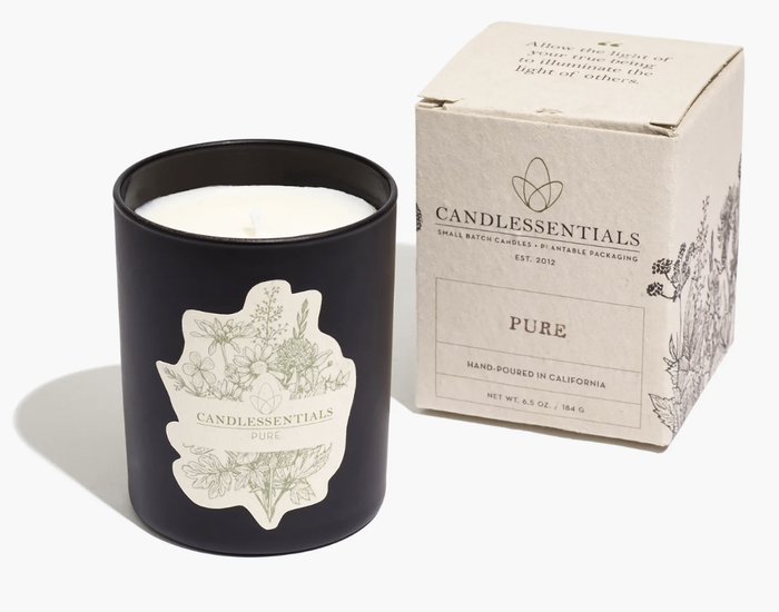 A candle along with its plantable packaging is shown.