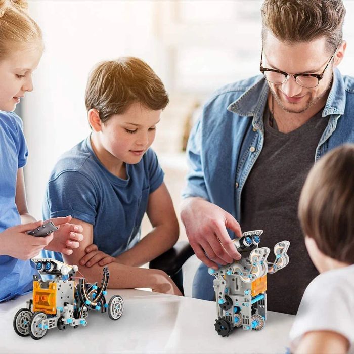 Adult and child models enjoying the robot kit together
