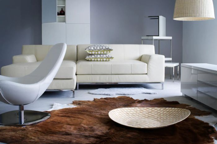 a cowhide rug displayed in a living room