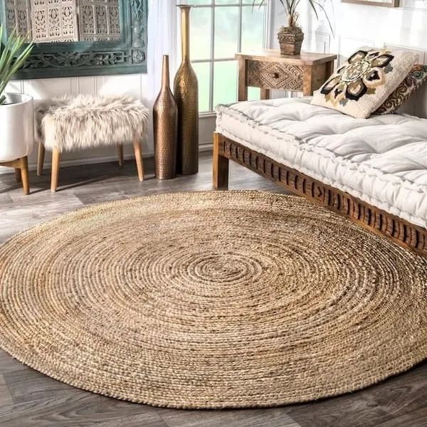 round natural jute rug on the floor