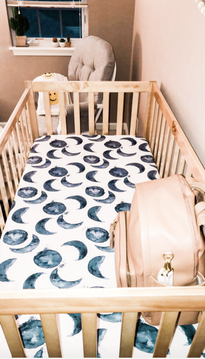 A reviewer’s photo of the moon-patterned sheets