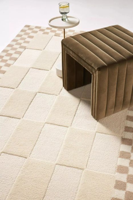 beige and white checkered patterned rug