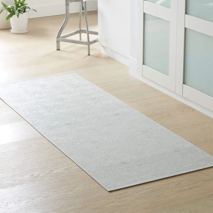 blue mosaic-patterned woven rug