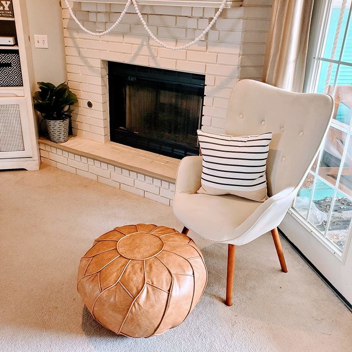 The ottoman displayed in a living room