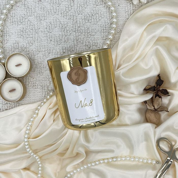 A gold candle with the label