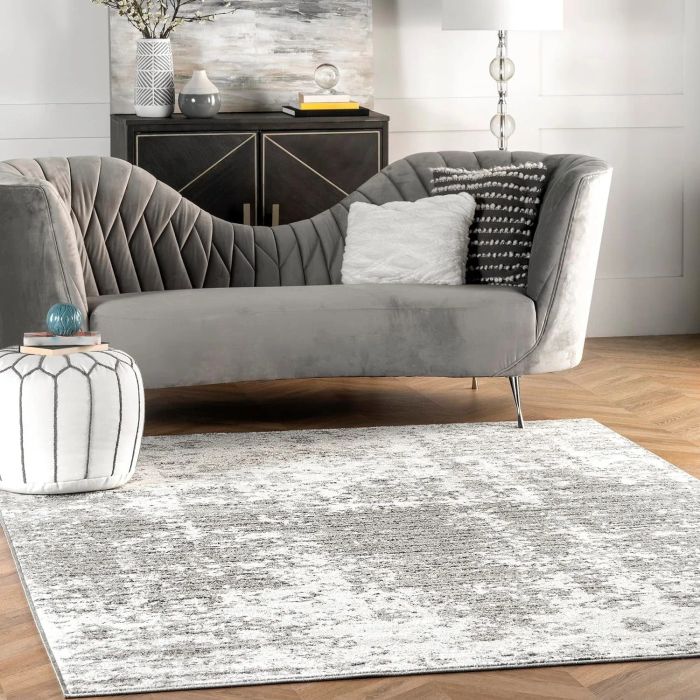 grey and white patterned area rug
