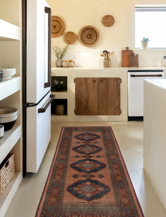 red and green geometric-patterned runner rug
