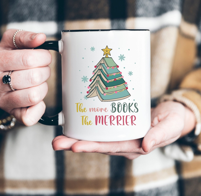 A model holding the mug that reads 