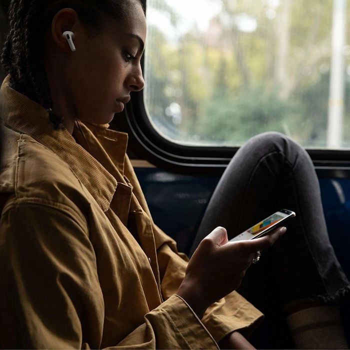 A person wearing the sleek Apple AirPods Pro, enjoying the perfect fit and exceptional sound quality.