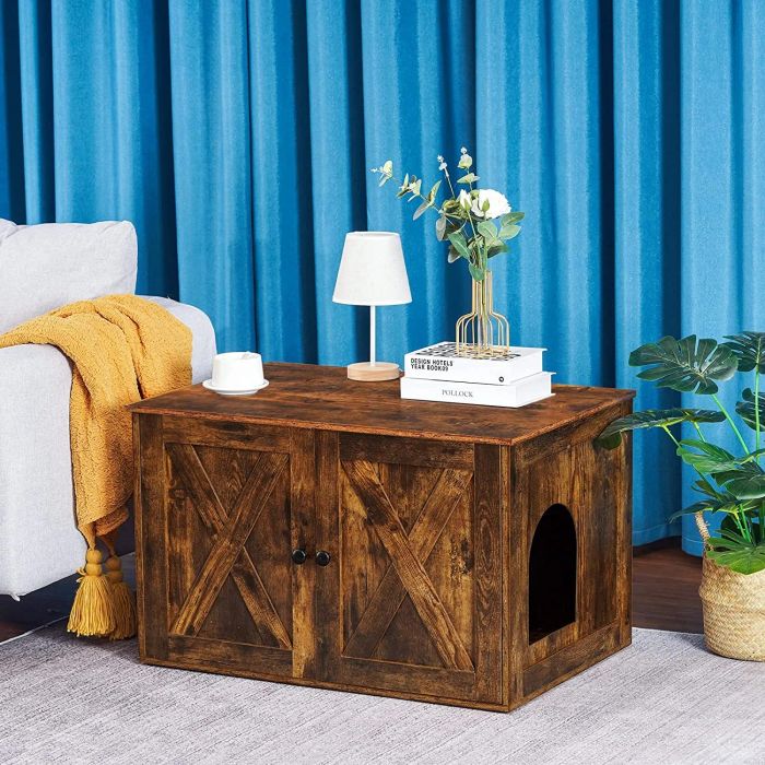 a large, rustic-style side table with a cutout hole for the cat to enter