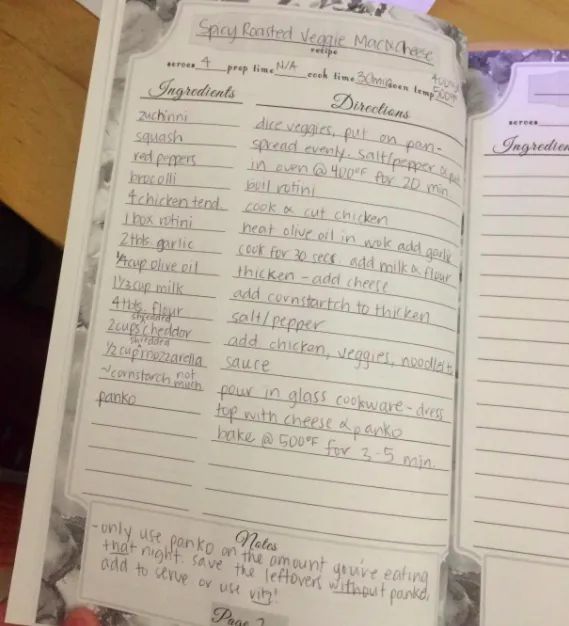 A customer review photo showing the inside of the blank cookbook, filled with a handwritten recipe.