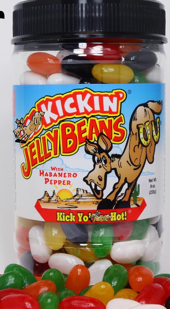 A jar filled with jelly beans 