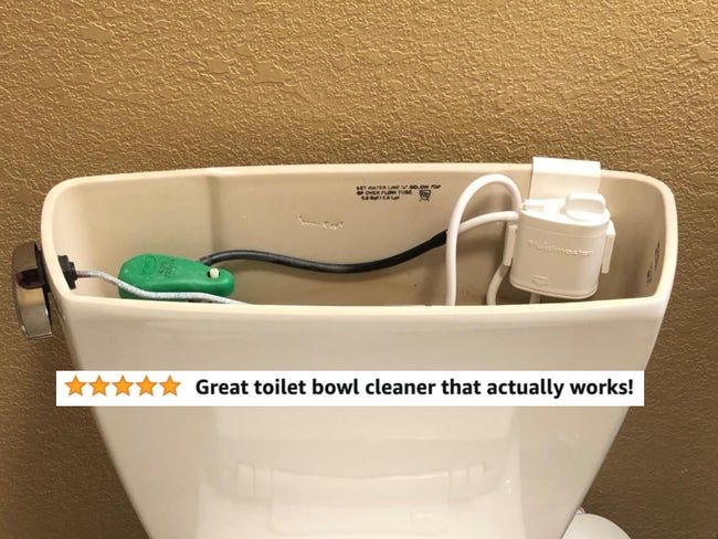 A reviewer's toilet cistern with the system installed, accompanied by glowing five-star praise.
