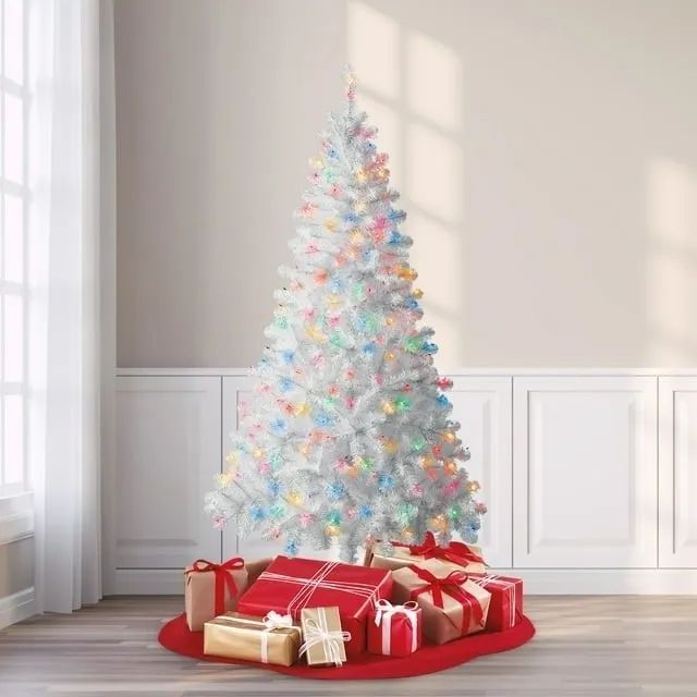 White tree adorned with multi-colored lights