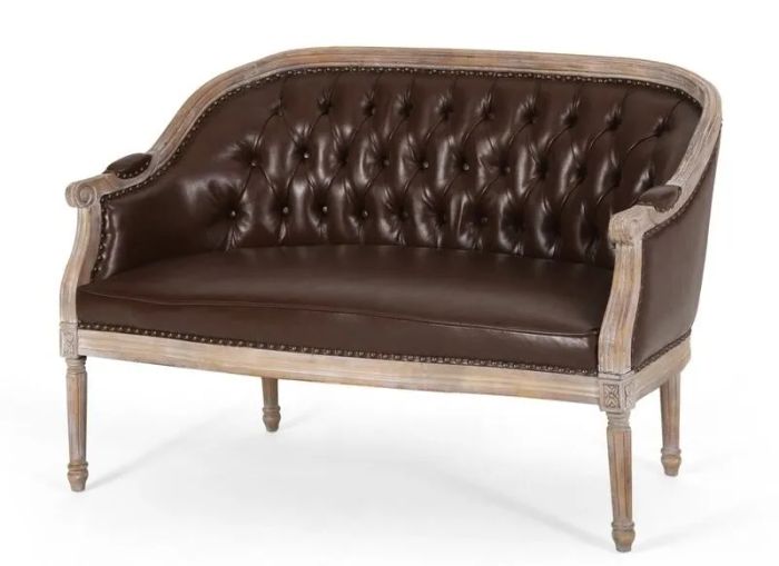 A charming French country-style loveseat in a deep, rich brown tone.