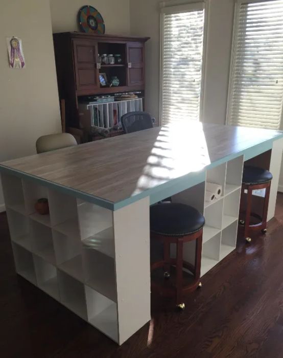 a reviewer’s image of the shelves combined to form a large table with multiple seating areas and ample storage