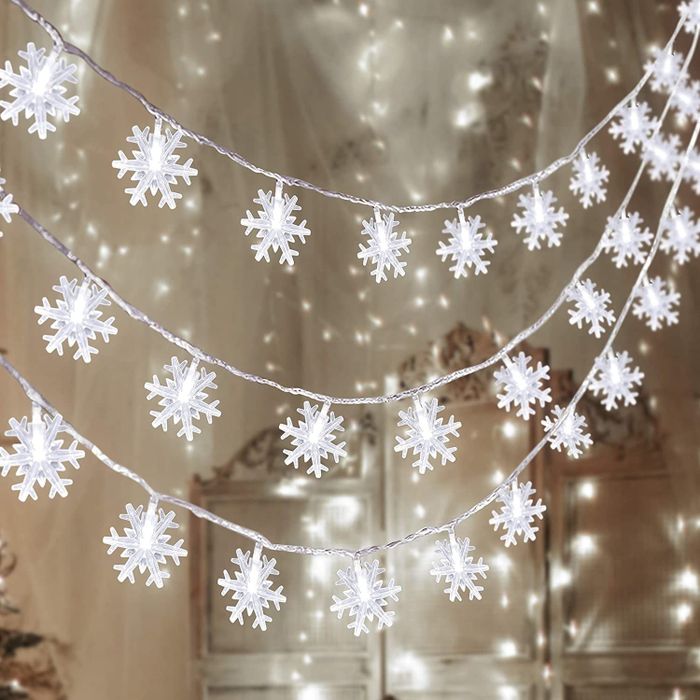 The snowflake LED string lights glowing softly