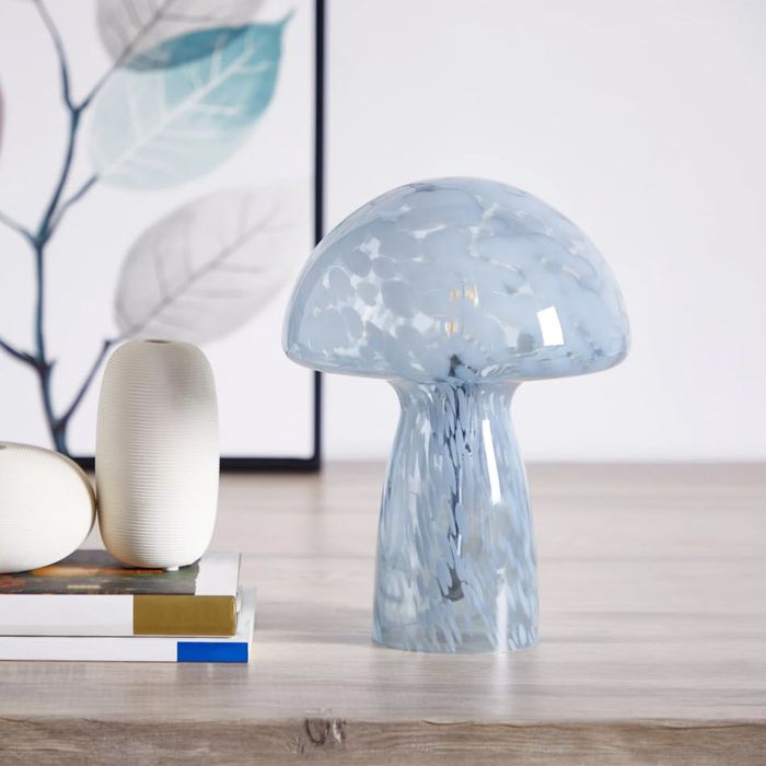 Sleek blue mushroom-shaped lamp with a modern aesthetic