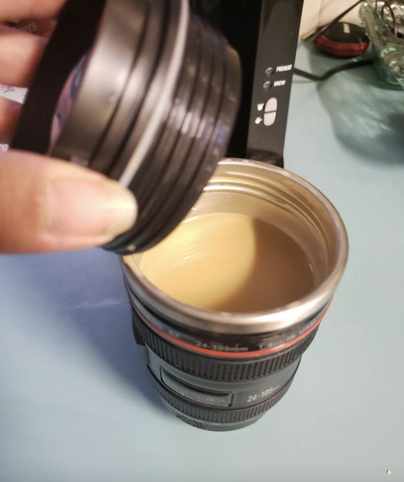 The lid removed to reveal the coffee inside