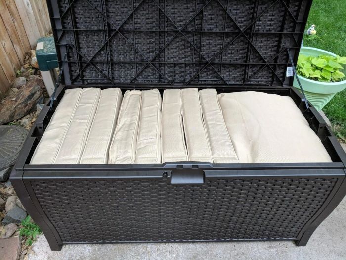 the storage bench with pillows tucked inside