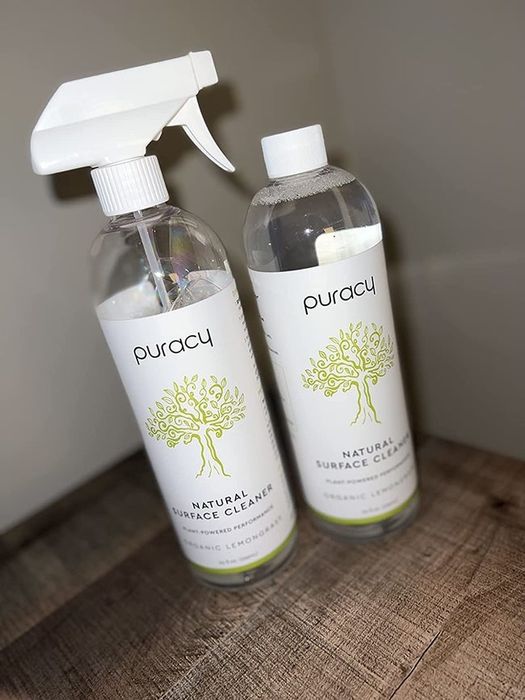 A reviewer's spray bottle and refill container.