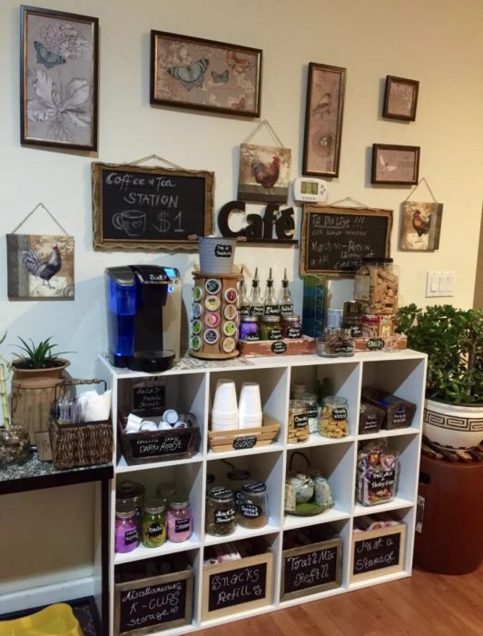 a reviewer’s cube shelves repurposed as a coffee and snack station