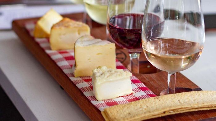 Create a cheese and wine pairing experience