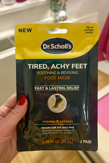 A small pouch containing two foot masks 