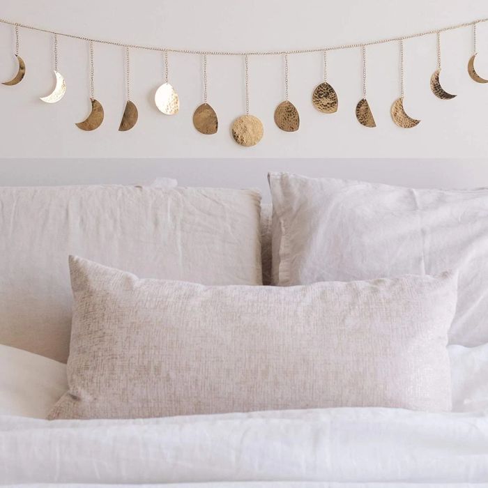 The garland elegantly draped above someone's bed, adding a celestial touch to the room.