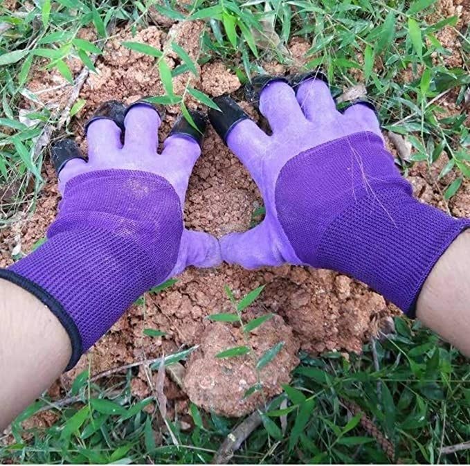 A model demonstrating the use of claw gloves while gardening