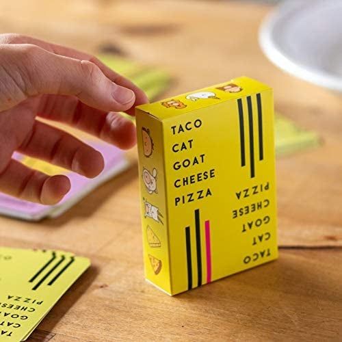 A small box holding the card game, Taco Cat Goat Cheese Pizza.