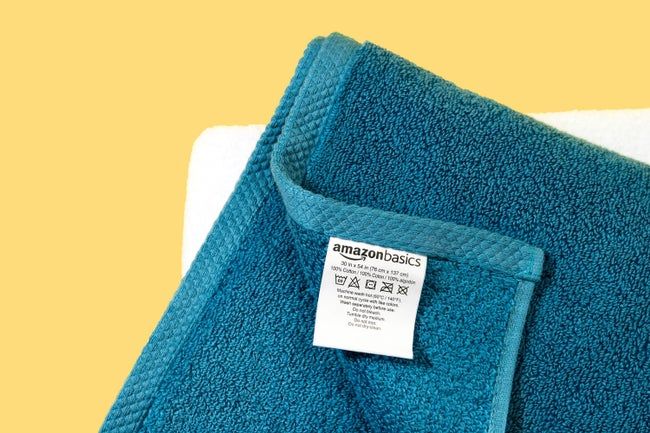A closeup of the tag on an Amazon Basics towel