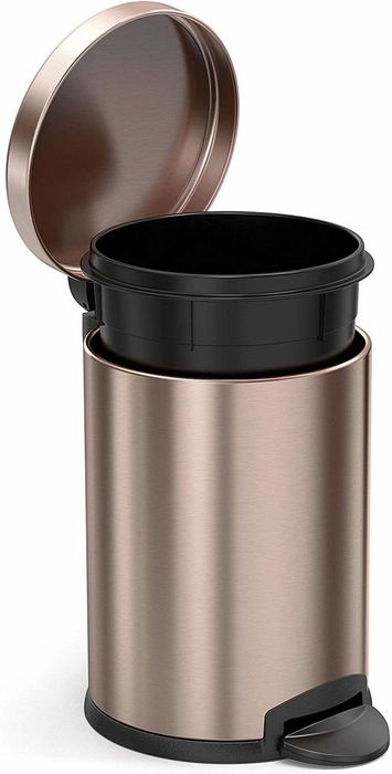 A small copper-colored cylindrical trash can with a step pedal to open.