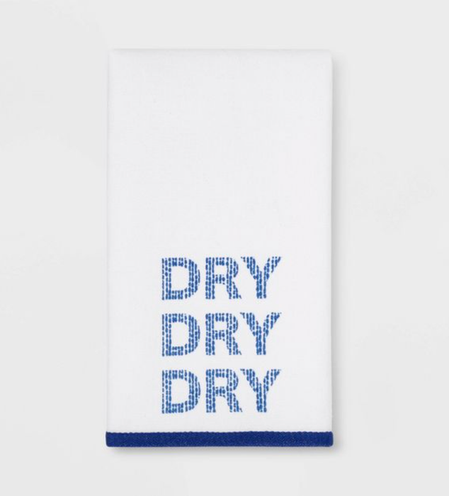 A blue and white towel with a simple yet stylish design that reads