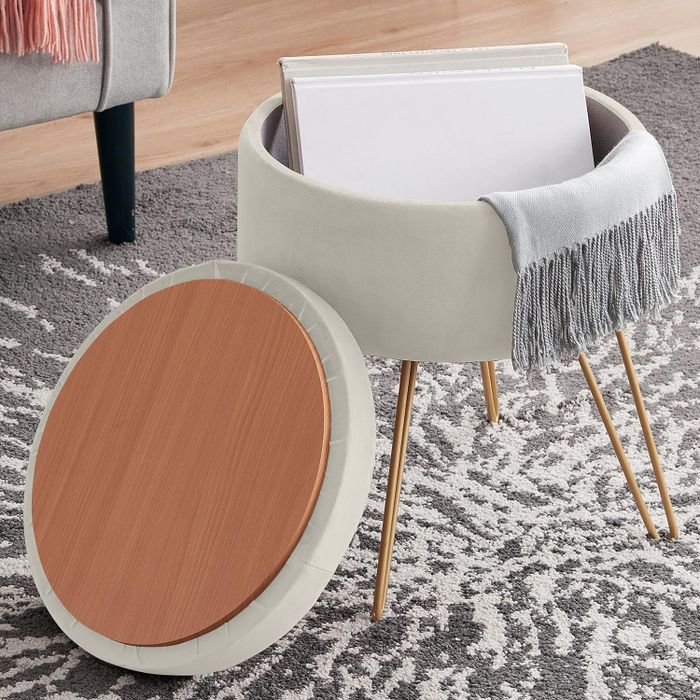 Cream-colored storage ottoman with sleek design
